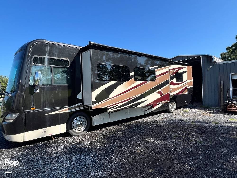 2015 Coachmen Sportscoach 404RB - Used Diesel Pusher For Sale by Pop RVs in Morgan City, Louisiana features Awning, Leveling Jacks, Air Conditioning, Slideout, Generator