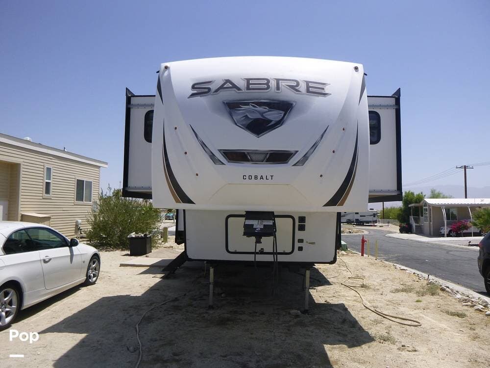 2021 Forest River Sabre 37FLH - Used Fifth Wheel For Sale by Pop RVs in Desert Hot Springs, California features Awning, Air Conditioning, Slideout, Leveling Jacks