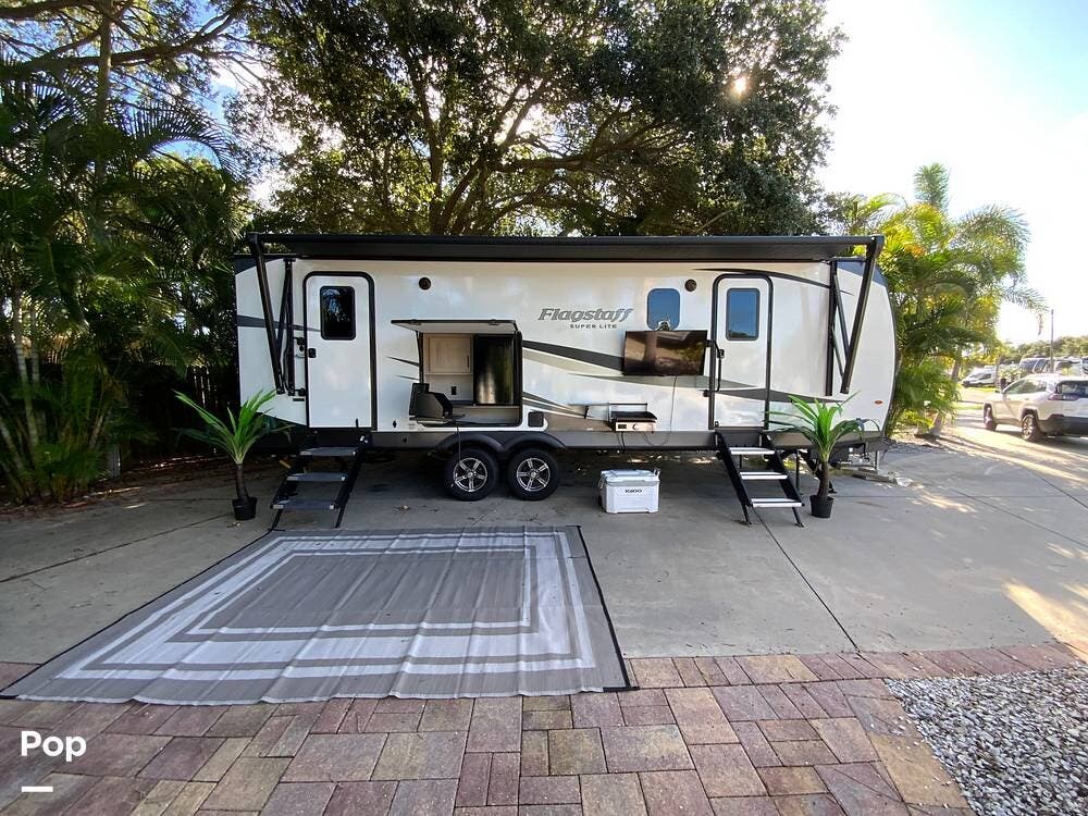 2023 Forest River Flagstaff 26RKBS - Used Travel Trailer For Sale by Pop RVs in St Petersburg, Florida features Slideout, Awning, Air Conditioning, Leveling Jacks