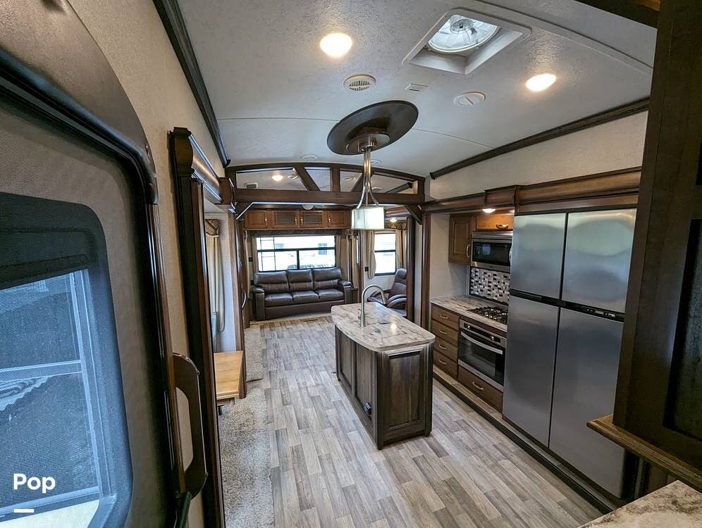 2018 Keystone Montana 3660RL Legacy Edition - Used Fifth Wheel For Sale by Pop RVs in Sarasota, Florida features Air Conditioning, Leveling Jacks, Awning, Slideout