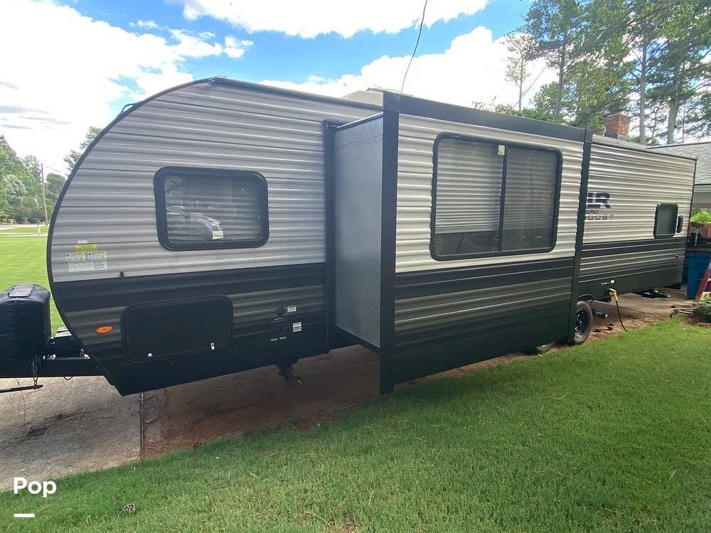 2022 Forest River XLR Micro Boost 27LRLE - Used Toy Hauler For Sale by Pop RVs in Lawrenceville, Georgia features Slideout, Awning, Air Conditioning