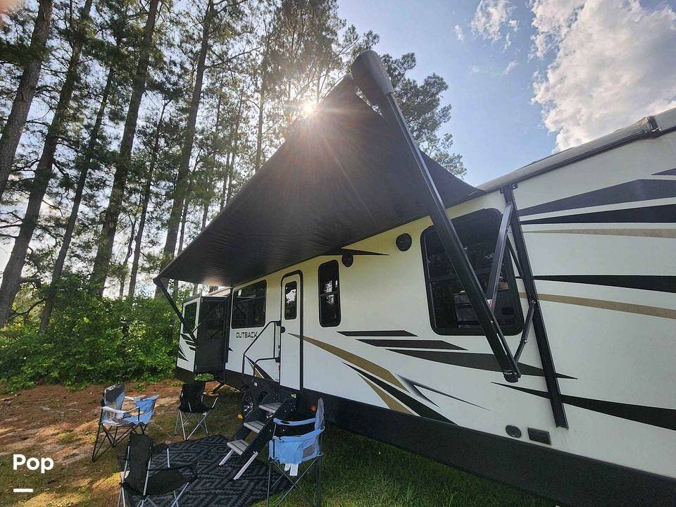 2021 Keystone Outback 341RD - Used Travel Trailer For Sale by Pop RVs in Fayetteville, North Carolina features Slideout, Leveling Jacks, Air Conditioning, Awning