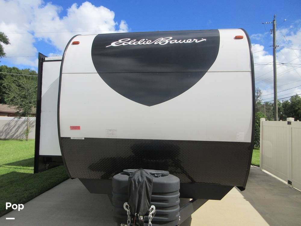 2024 Heartland Eddie Bauer 34BHS - Used Travel Trailer For Sale by Pop RVs in Valrico, Florida features Slideout, Awning, Air Conditioning, Leveling Jacks
