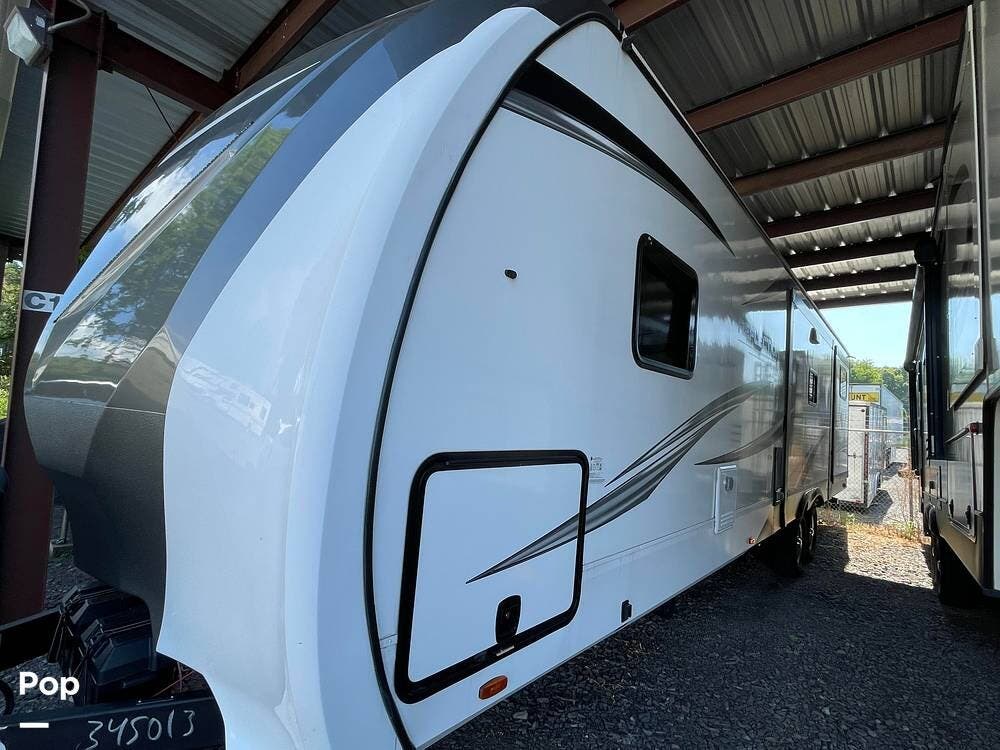 2023 Grand Design Reflection 312BHTS - Used Travel Trailer For Sale by Pop RVs in Russellville, Arkansas features Slideout, Awning, Leveling Jacks, Air Conditioning