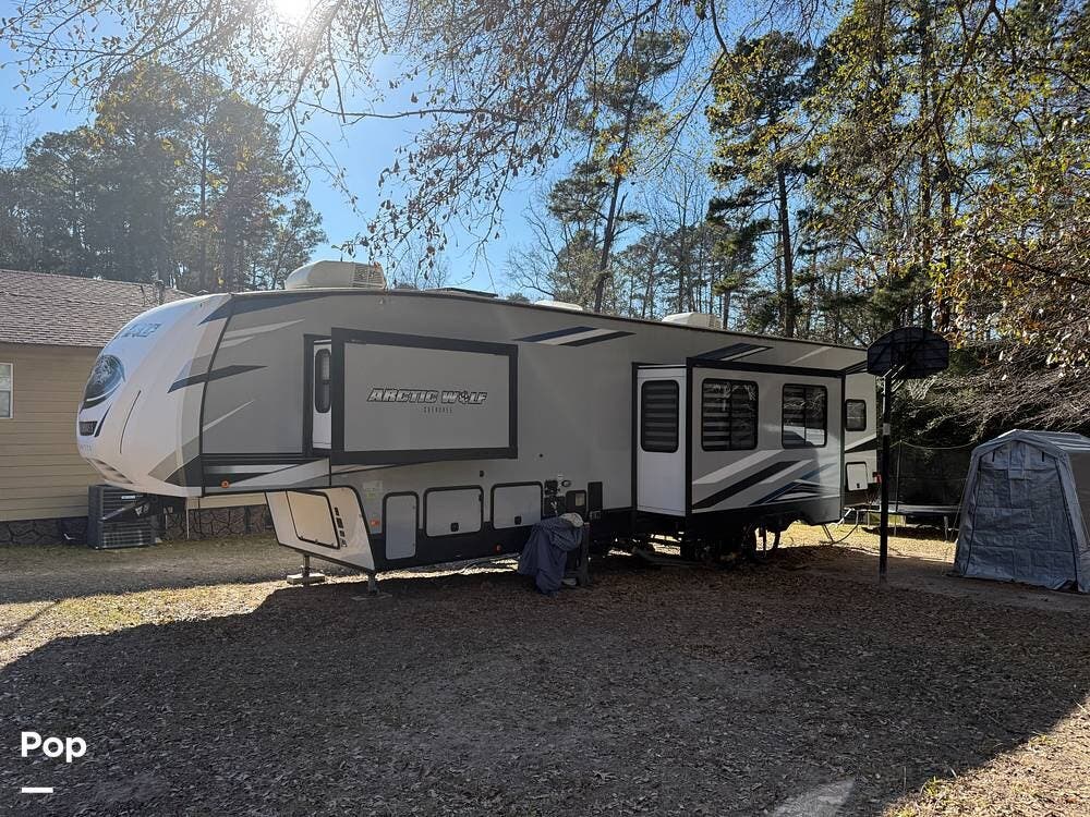 2021 Cherokee Arctic Wolf 3770SUITE - Used Fifth Wheel For Sale by Pop RVs in Gilmer, Texas features Air Conditioning, Awning, Slideout, Leveling Jacks