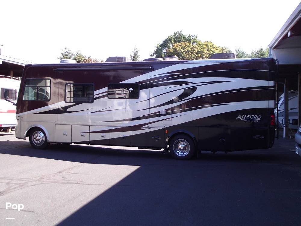 2011 Tiffin Allegro 32CA - Used Class A For Sale by Pop RVs in Vancouver, Washington features Generator, Leveling Jacks, Air Conditioning, Slideout, Awning