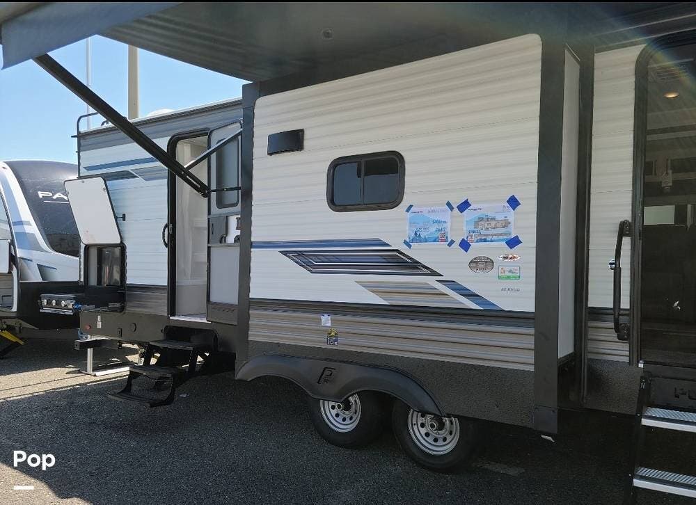 2023 Forest River Puma 32BH2B - Used Travel Trailer For Sale by Pop RVs in Scott, Louisiana features Slideout, Awning, Air Conditioning