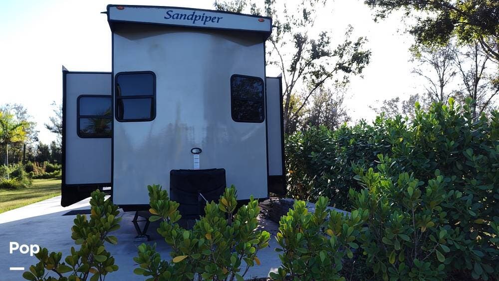 2021 Forest River Sandpiper 399LOFT - Used Park Model For Sale by Pop RVs in Estero, Florida features Air Conditioning, Slideout, Awning, Leveling Jacks