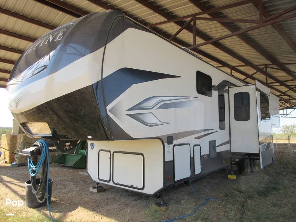 2023 Keystone Alpine 3790FK - Used Fifth Wheel For Sale by Pop RVs in Floresville, Texas features Slideout, Leveling Jacks, Air Conditioning, Awning