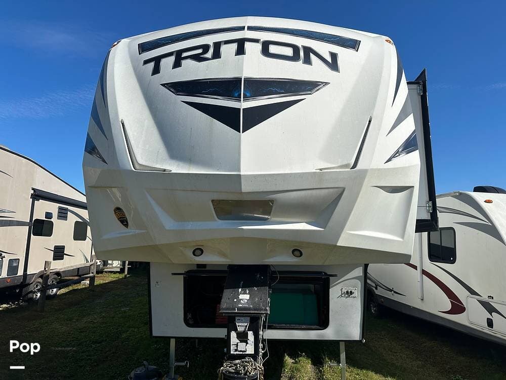 2018 Dutchmen Voltage Triton 3551 - Used Toy Hauler For Sale by Pop RVs in Chesapeake, Virginia features Awning, Generator, Leveling Jacks, Air Conditioning, Slideout