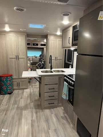2022 Rockwood Ultra-Lite 2912BS - Used Travel Trailer For Sale by Pop RVs in Guntersville, Alabama features Awning, Leveling Jacks, Air Conditioning, Slideout