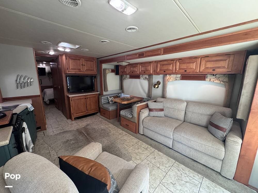 2011 Tiffin Allegro Open Road 35 QBA - Used Class A For Sale by Pop RVs in Scott, Louisiana features Leveling Jacks, Air Conditioning, Slideout, Generator, Awning