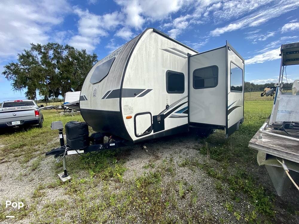 2022 Forest River Surveyor 240BHLE - Used Travel Trailer For Sale by Pop RVs in Lake Wales, Florida features Awning, Leveling Jacks, Air Conditioning, Slideout