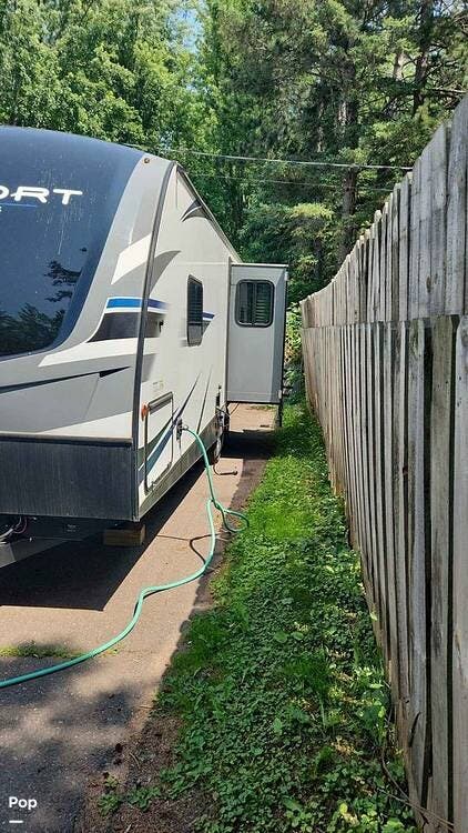 2021 Keystone Passport GT 2521RL - Used Travel Trailer For Sale by Pop RVs in Moose Lake, Minnesota features Awning, Slideout, Air Conditioning