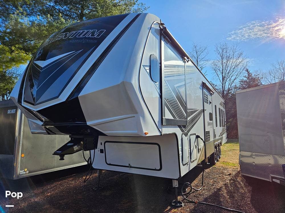 2023 Grand Design Momentum 398M - Used Fifth Wheel For Sale by Pop RVs in Hillsborough, New Jersey features Slideout, Generator, Awning, Leveling Jacks, Air Conditioning