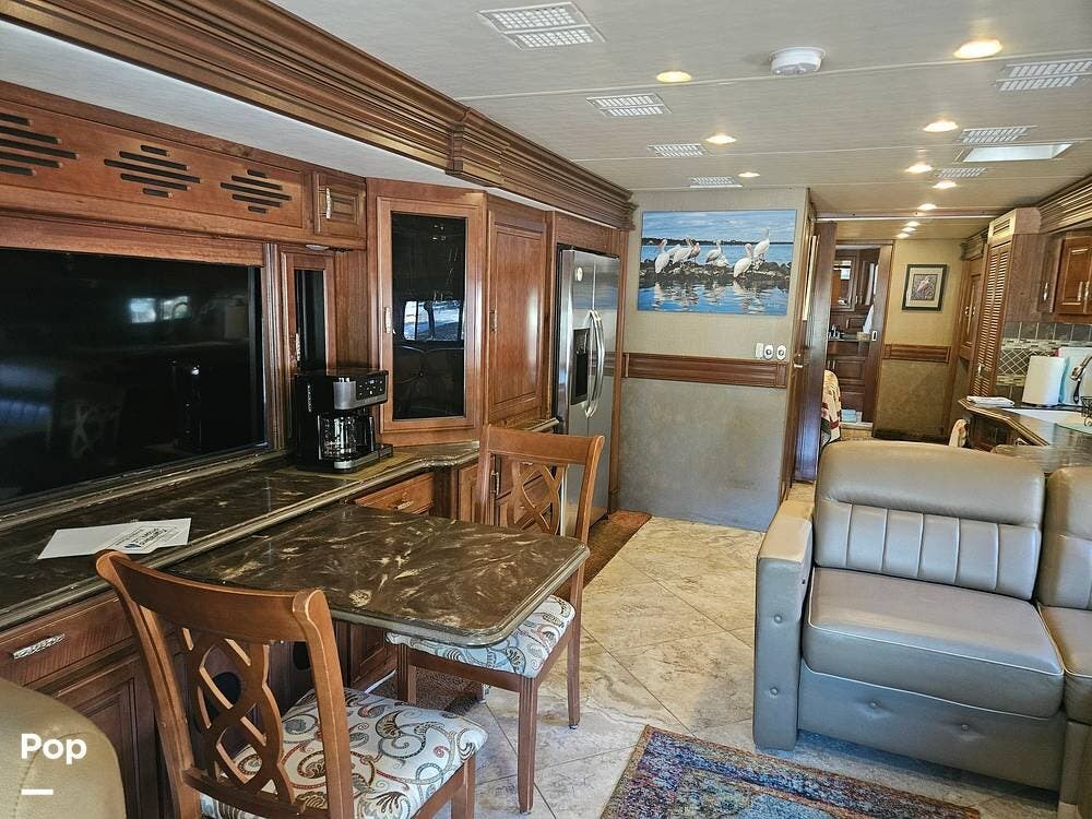 2014 Fleetwood Discovery 40E - Used Diesel Pusher For Sale by Pop RVs in Rockport, Texas features Slideout, Generator, Air Conditioning, Awning, Leveling Jacks