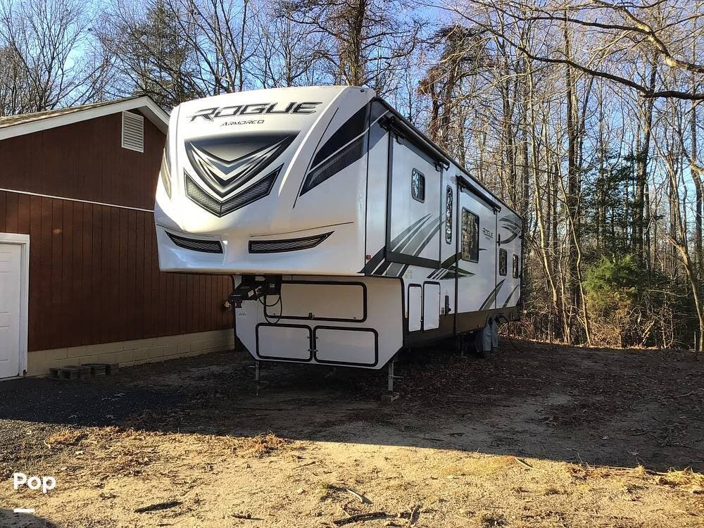 2021 Forest River Rogue 371A13 - Used Toy Hauler For Sale by Pop RVs in Prince Frederick, Maryland features Generator, Awning, Leveling Jacks, Slideout, Air Conditioning