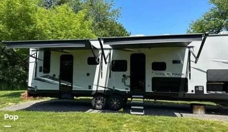2021 Forest River Wolf Pack 335PACK13 - Used Toy Hauler For Sale by Pop RVs in Wappingers Falls, New York features Awning, Generator, Air Conditioning, Slideout, Leveling Jacks
