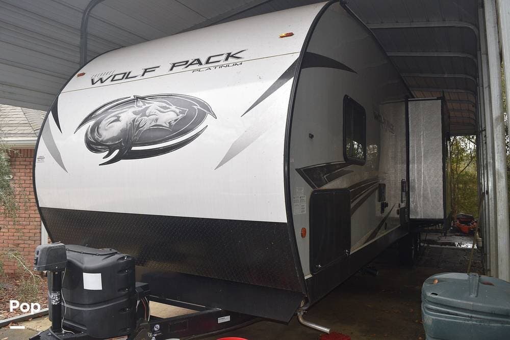 2022 Forest River Wolf Pack 23PACK15 - Used Toy Hauler For Sale by Pop RVs in Crestview, Florida features Leveling Jacks, Slideout, Generator, Air Conditioning, Awning