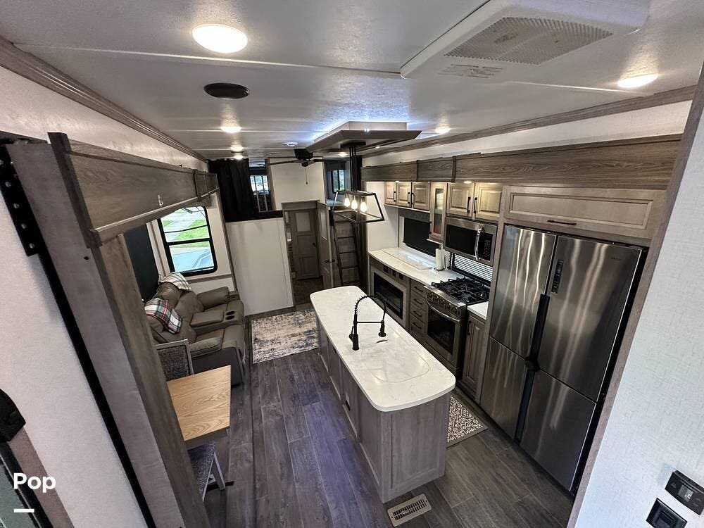 2023 Dutchmen Yukon 412BH - Used Fifth Wheel For Sale by Pop RVs in Fulshear, Texas features Leveling Jacks, Air Conditioning, Slideout, Awning