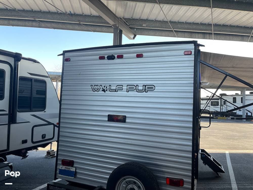 2022 Forest River Wolf Pup 16FQ - Used Travel Trailer For Sale by Pop RVs in Wylie, Texas features Leveling Jacks, Air Conditioning, Awning