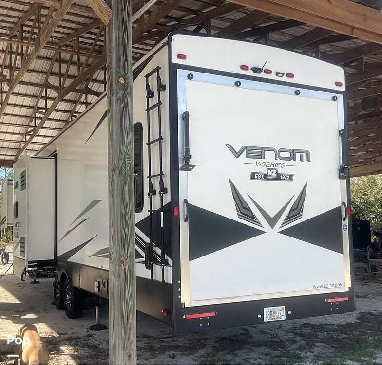 2022 K-Z Venom V3413TK - Used Toy Hauler For Sale by Pop RVs in Punta Gorda, Florida features Generator, Leveling Jacks, Air Conditioning, Awning, Slideout
