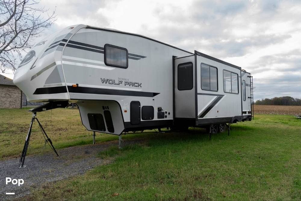2021 Forest River Cherokee Wolf Pack 315PACK12 - Used Toy Hauler For Sale by Pop RVs in Athens, Alabama features Leveling Jacks, Awning, Slideout, Air Conditioning, Generator