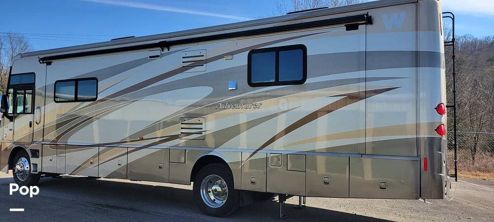 2012 Winnebago Adventurer 35P - Used Class A For Sale by Pop RVs in Oak Ridge, Tennessee features Leveling Jacks, Generator, Air Conditioning, Slideout, Awning