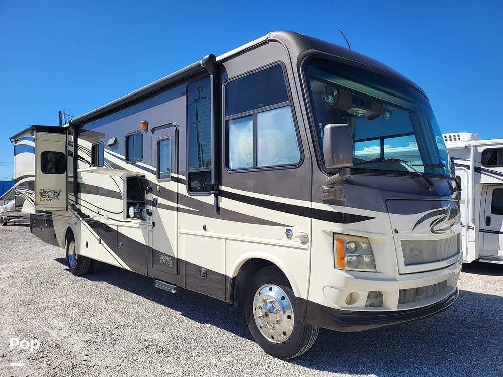 2011 Damon Challenger 368 - Used Class A For Sale by Pop RVs in Cape Canaveral, Florida features Leveling Jacks, Air Conditioning, Awning, Generator, Slideout