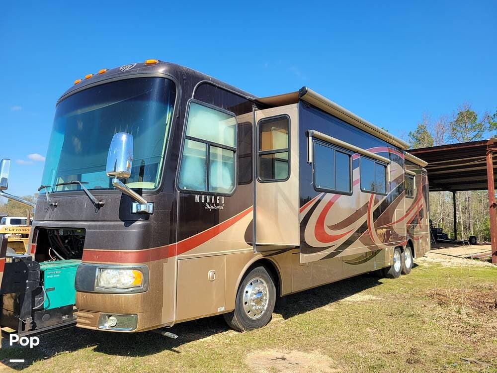 2011 Monaco RV Diplomat 42PAQ - Used Diesel Pusher For Sale by Pop RVs in Lucedale, Mississippi features Awning, Leveling Jacks, Slideout, Generator, Air Conditioning