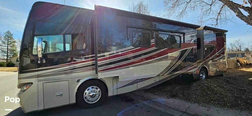 2013 Tiffin Phaeton 40QBH - Used Diesel Pusher For Sale by Pop RVs in Aurora, Colorado features Awning, Slideout, Generator, Air Conditioning, Leveling Jacks