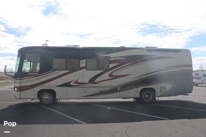 2010 Monaco RV Cayman 38PKQ - Used Diesel Pusher For Sale by Pop RVs in Clarkston, Washington features Air Conditioning, Slideout, Leveling Jacks, Generator, Awning