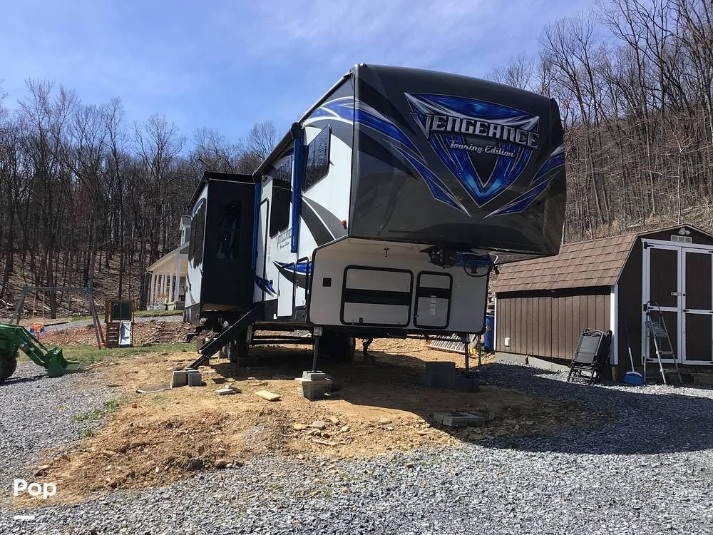 2019 Forest River Vengeance 381L12-6 - Used Toy Hauler For Sale by Pop RVs in Hedgesville, West Virginia features Awning, Slideout, Air Conditioning, Generator, Leveling Jacks