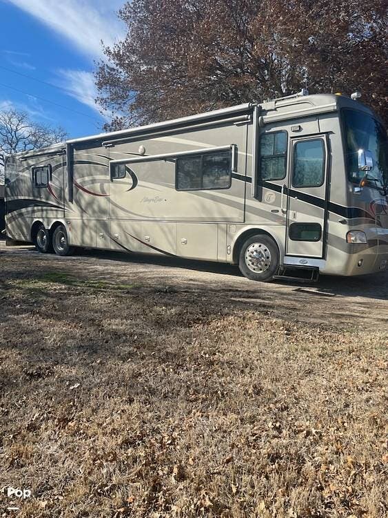 2006 Tiffin Allegro Bus 42QDP - Used Diesel Pusher For Sale by Pop RVs in Abilene, Texas features Slideout, Air Conditioning, Leveling Jacks, Generator
