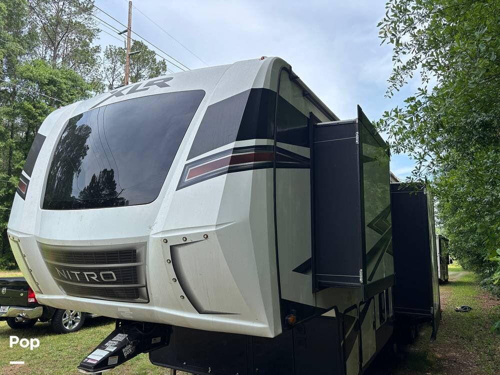 2021 Forest River XLR Nitro 35DK5 - Used Toy Hauler For Sale by Pop RVs in Buckhead, Georgia features Leveling Jacks, Air Conditioning, Awning, Generator, Slideout