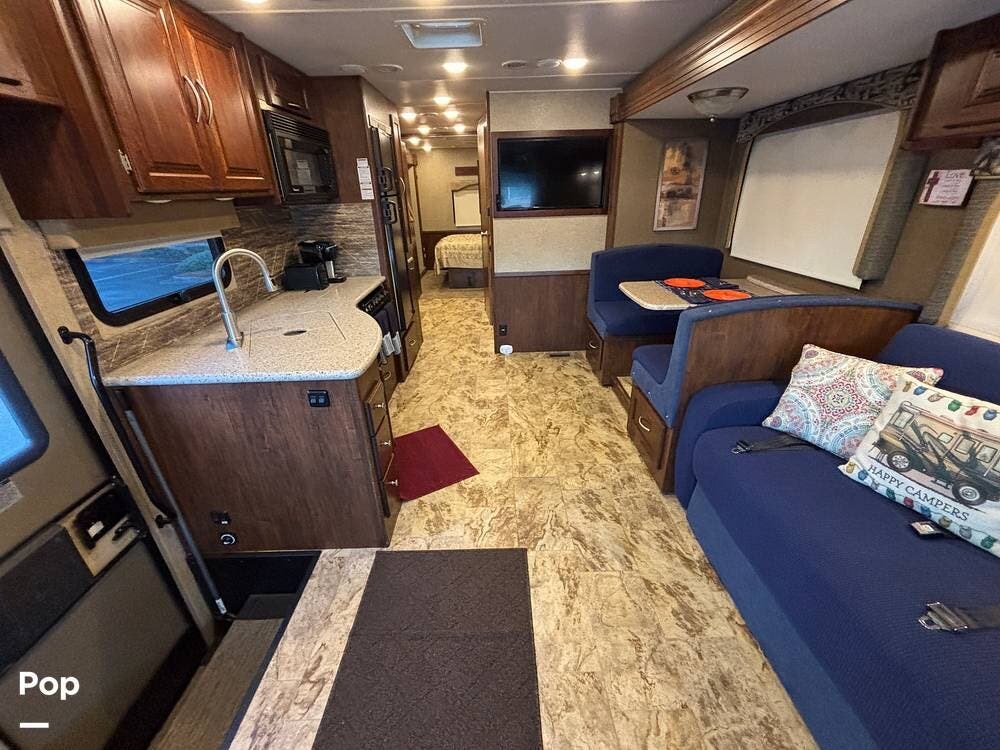 2017 Coachmen Mirada 34BH - Used Class A For Sale by Pop RVs in Orlando, Florida features Leveling Jacks, Slideout, Air Conditioning, Awning, Generator