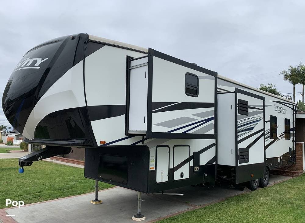 2021 Heartland Gravity GR3510 - Used Toy Hauler For Sale by Pop RVs in Costa Mesa, California features Awning, Air Conditioning, Slideout, Generator, Leveling Jacks