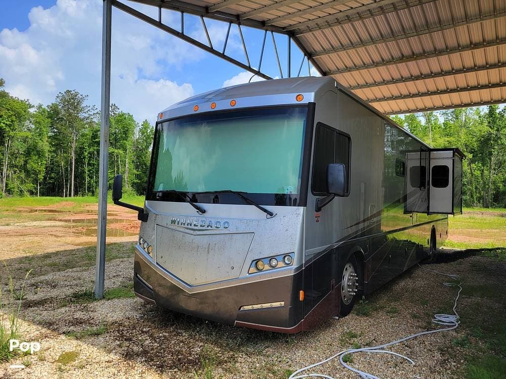 2014 Winnebago Forza 38R - Used Diesel Pusher For Sale by Pop RVs in Walker, Louisiana features Slideout, Awning, Air Conditioning, Leveling Jacks, Generator