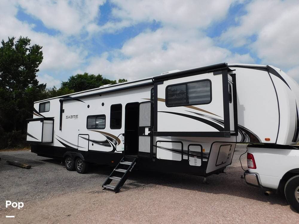 2021 Forest River Sabre 37FLL - Used Fifth Wheel For Sale by Pop RVs in Palm City, Florida features Air Conditioning, Slideout, Awning, Leveling Jacks