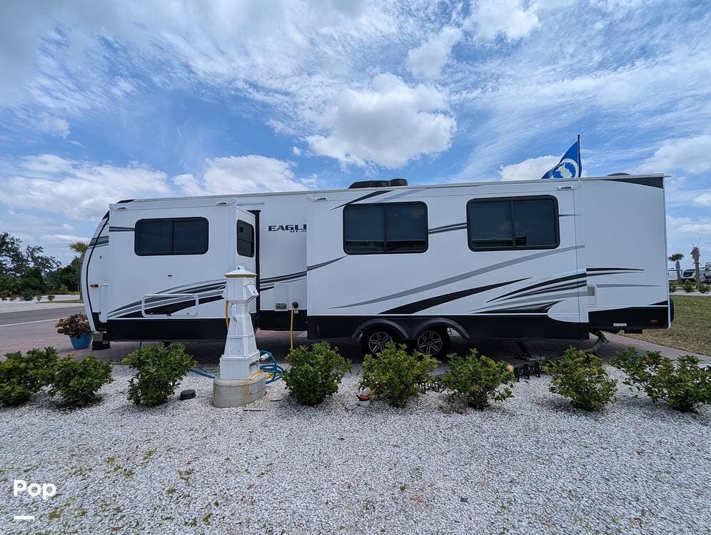 2022 Jayco Eagle HT 320FBOK - Used Travel Trailer For Sale by Pop RVs in Jamestown, New York features Air Conditioning, Leveling Jacks, Slideout, Awning