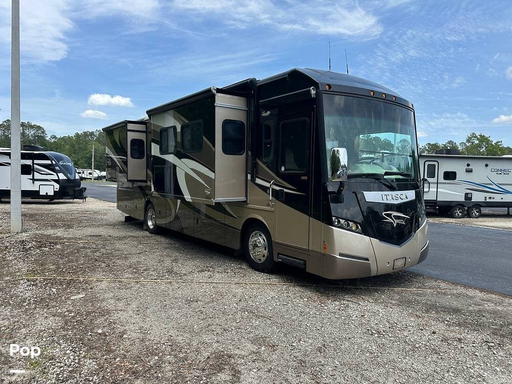 2013 Itasca Meridian 34B - Used Diesel Pusher For Sale by Pop RVs in Green Cove Springs, Florida features Slideout, Leveling Jacks, Awning, Generator, Air Conditioning