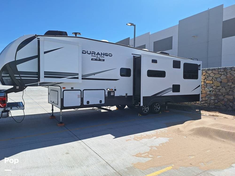 2022 K-Z Durango 290RLT - Used Fifth Wheel For Sale by Pop RVs in El Paso, Texas features Leveling Jacks, Slideout, Awning, Air Conditioning