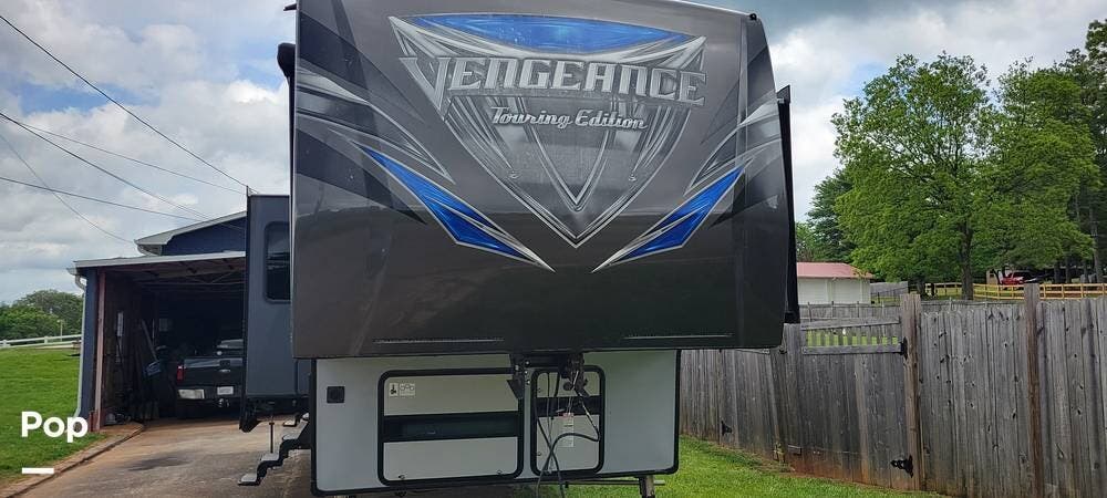 2017 Forest River Vengeance 38L12 - Used Toy Hauler For Sale by Pop RVs in Maryville, Tennessee features Leveling Jacks, Generator, Air Conditioning, Awning, Slideout