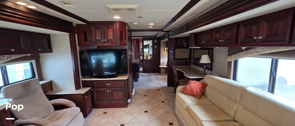 2009 Fleetwood Revolution LE 42K - Used Diesel Pusher For Sale by Pop RVs in Madill, Oklahoma features Air Conditioning, Leveling Jacks, Slideout, Generator, Awning