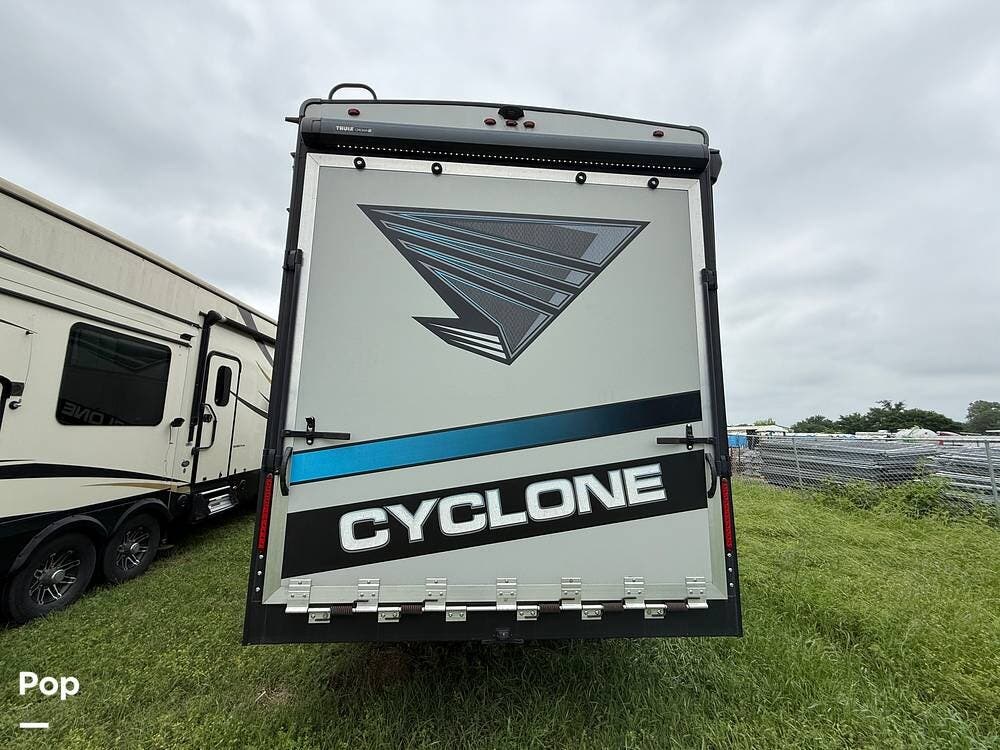 2021 Heartland Cyclone 4214 - Used Toy Hauler For Sale by Pop RVs in Pilot Point, Texas features Slideout, Air Conditioning, Awning, Generator, Leveling Jacks