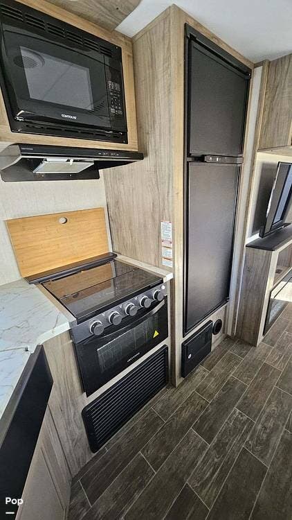 2021 Cherokee Alpha Wolf 26RB-L - Used Travel Trailer For Sale by Pop RVs in Reno, Nevada features Slideout, Awning, Air Conditioning