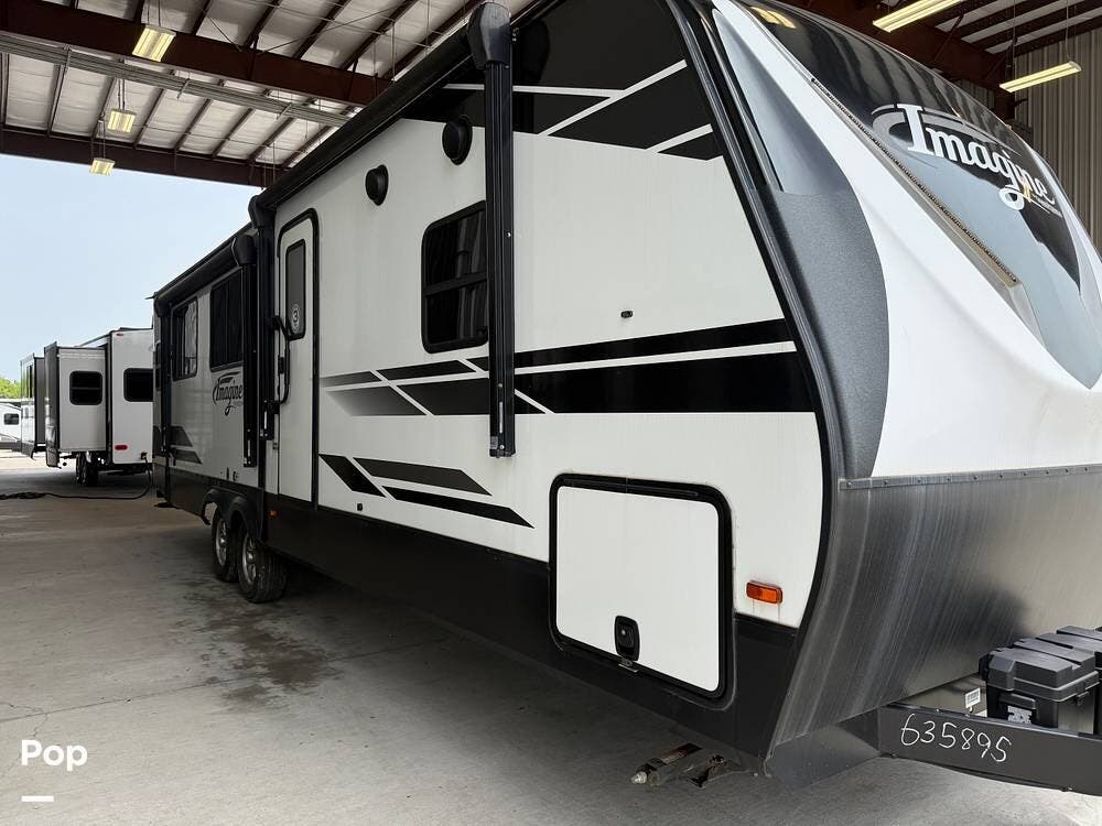2022 Grand Design Imagine 2970RL - Used Travel Trailer For Sale by Pop RVs in Jacksonville, Texas features Air Conditioning, Leveling Jacks, Awning, Slideout