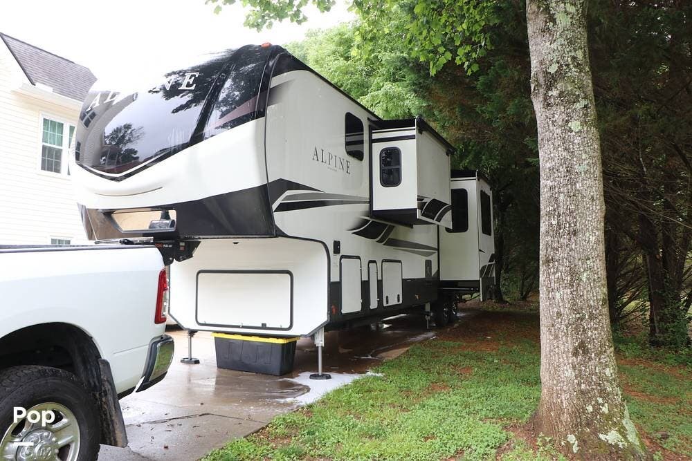 2021 Keystone Alpine 3910RK - Used Fifth Wheel For Sale by Pop RVs in Dawsonville, Georgia features Awning, Air Conditioning, Leveling Jacks, Slideout