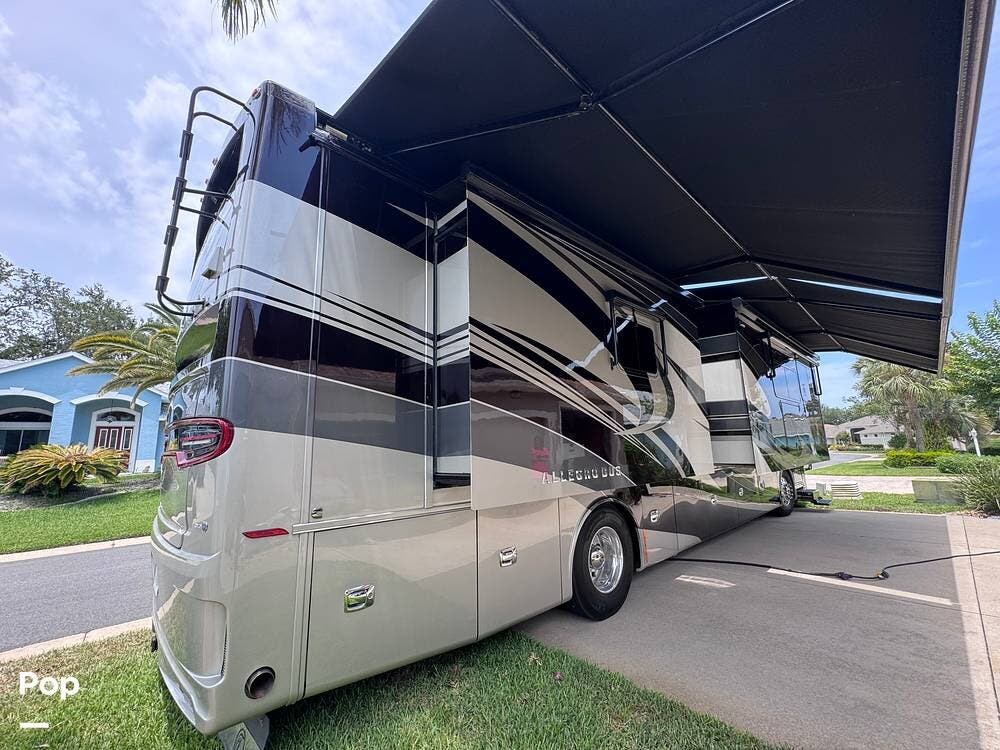 2019 Tiffin Allegro Bus 40IP - Used Diesel Pusher For Sale by Pop RVs in Tavares, Florida features Slideout, Generator, Air Conditioning, Leveling Jacks, Awning