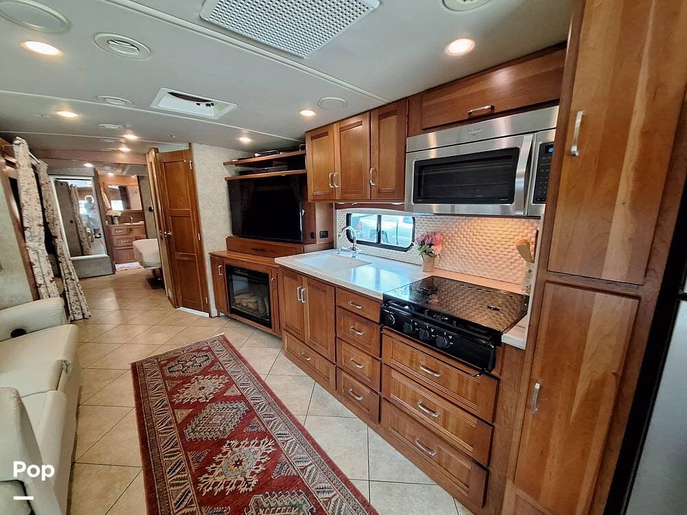 2014 Winnebago Forza 38R - Used Diesel Pusher For Sale by Pop RVs in Petaluma, California features Slideout, Air Conditioning, Awning, Leveling Jacks, Generator